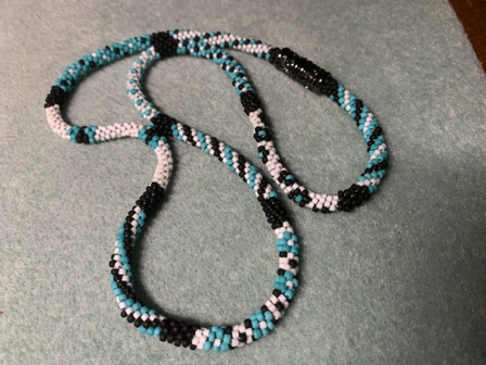 Oct 31 - Kumihimo necklace. Turquoise, black, and white size 11 beads.
